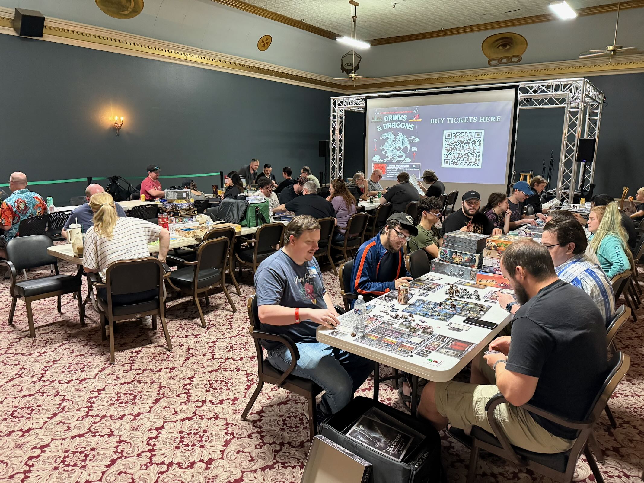 People playing board games at Viva Board Game Day 2025